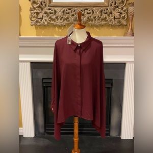 Button Down with dramatic batwing/dolman sleeves.